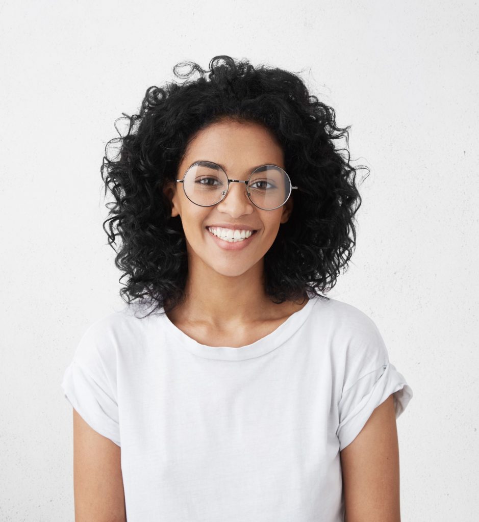 Young woman with glasses and great skin